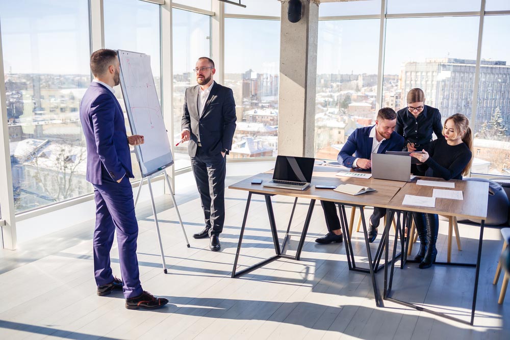Confident businessman makes a presentation